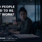 An employee surrounded by clocks, messages and watching eyes appears busy while meaningful work waits unfinished, illustrating why people pretend to be productive. Ask SRS article by Syed Raheel Shahzad.